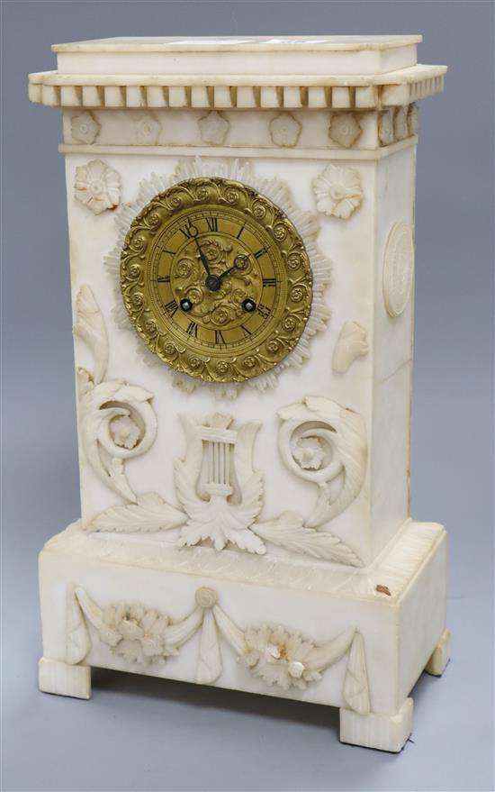 A 19th century French alabaster cased eight day mantel clock height 38cm
